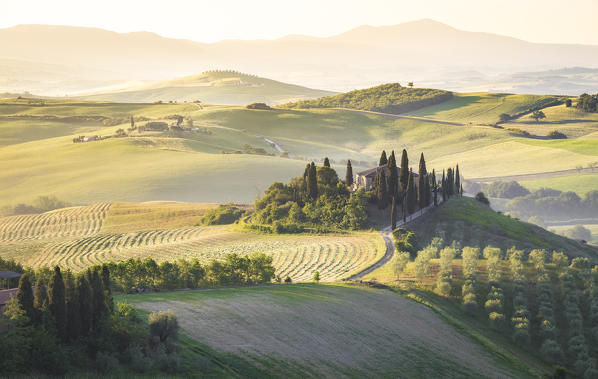 Podere Belvedere, the famous italian farmhouse, during sunrise. Val d'Orcia, Siena province, Tuscany, Italy