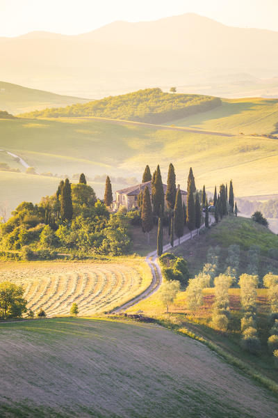 Podere Belvedere, the famous italian farmhouse, during sunrise. Val d'Orcia, Siena province, Tuscany, Italy
