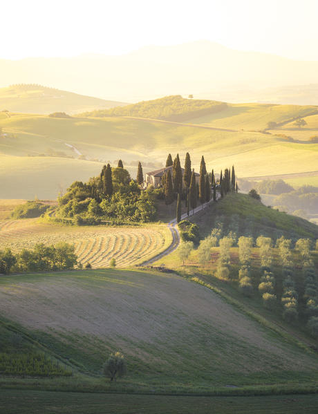 Podere Belvedere, the famous italian farmhouse, during sunrise. Val d'Orcia, Siena province, Tuscany, Italy