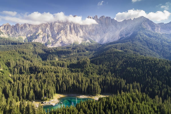 Elevated view of Lake Carezza and Mount Latemar, Bolzano province, Trentino Alto Adige, Italy