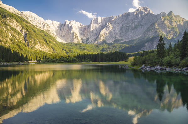 Superior Fusine Lake with Mount Mangart on the background. Fusine Lakes Natural Park, Tarvisio, Udine province, Friuli Venezia Giulia, Italy.