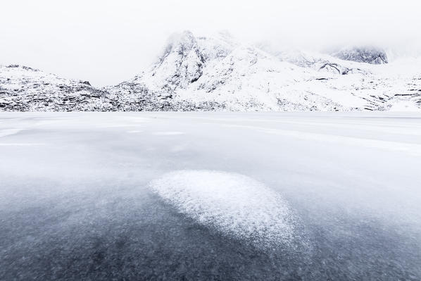 A frozen lake near Nusfjord, Lofoten Islands, Norway 