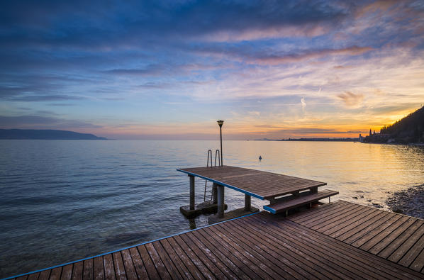 A pier near Toscolano Maderno village, on Garda Lake. Brescia Province, Lombardy, Italy