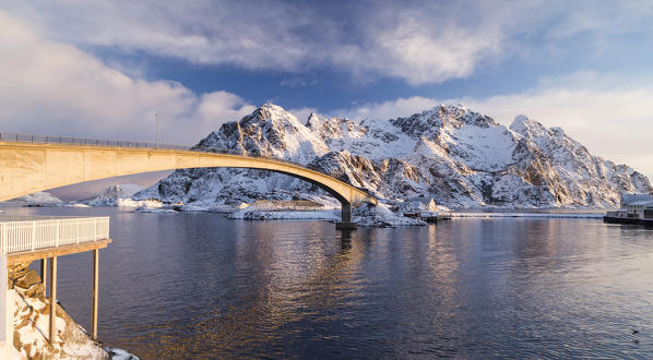 Bridge crossing to the mountains in the Fishing village of Henningsvær Fishing village, Lofoten Islands, Norway