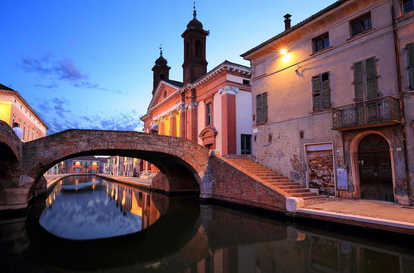 Comacchio village with a bridge at sunset. Ferrara district, Emilia Romagna, Italy